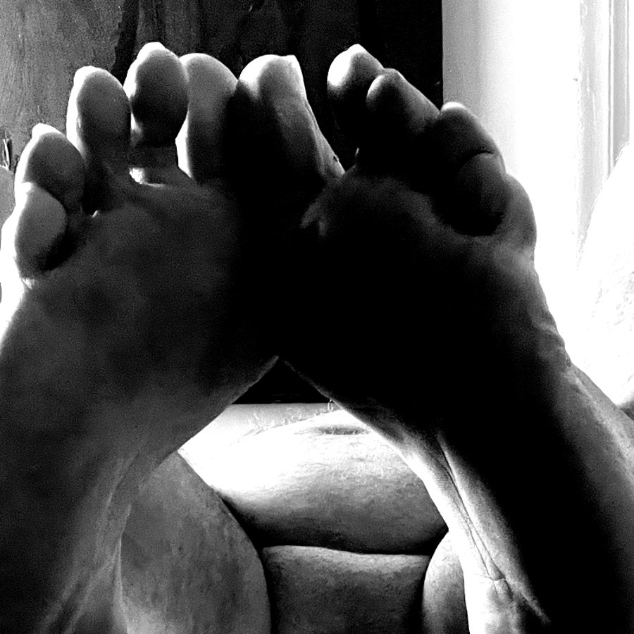 Aristocratic size 15 soles and long toes, black and white close-up
