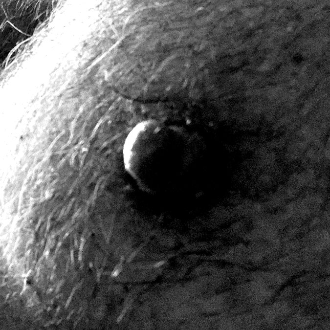 Hypnodaddy nipple close-up in black and white